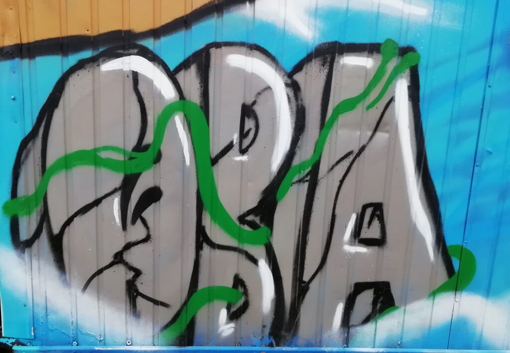 Titelbild zeigt eine Grafittiwabn mit dem Buchstaben OBA